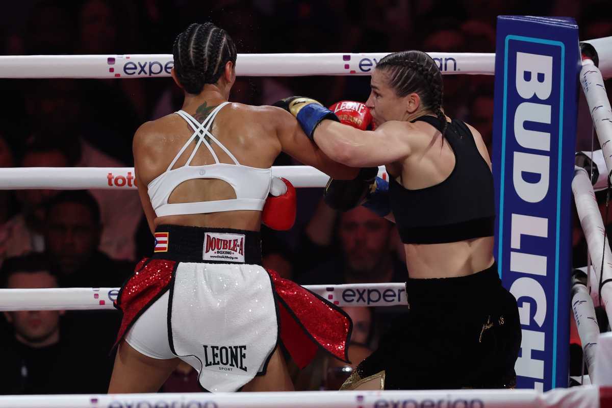 Boxing 'herstory': Katie Taylor bests Amanda Serrano in first all-women's card at Madison Square Garden 2 two women fighting in a boxing ring