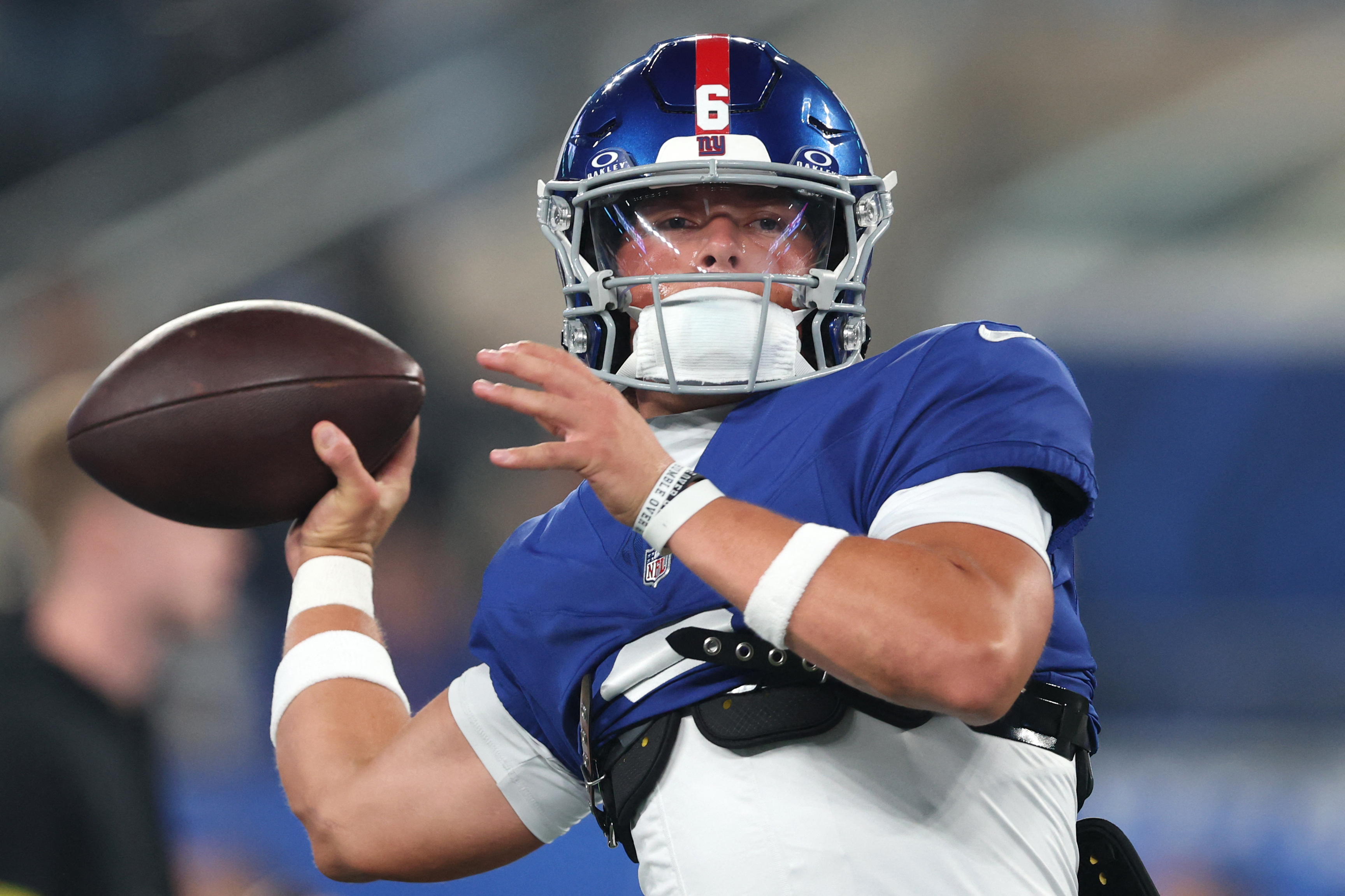 Giants offense disappears in loss to Chiefs, chants for Jaxson Dart grow 2 Jaxson Dart Giants Chiefs warmup: Football player in blue uniform warms up pregame