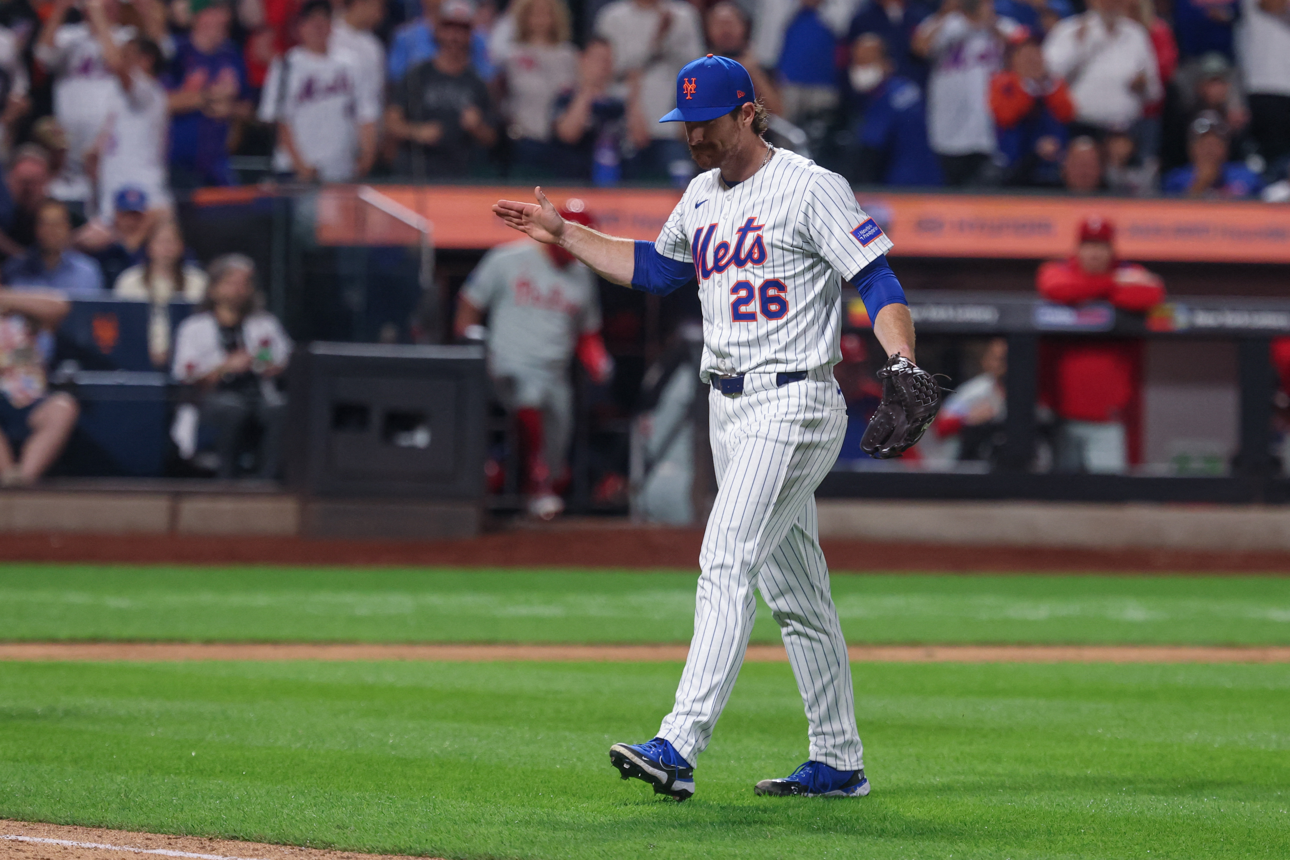 Mets' greatest hope is with the kids 4 Nolan McLean claps hands as he walks to dugout Mets