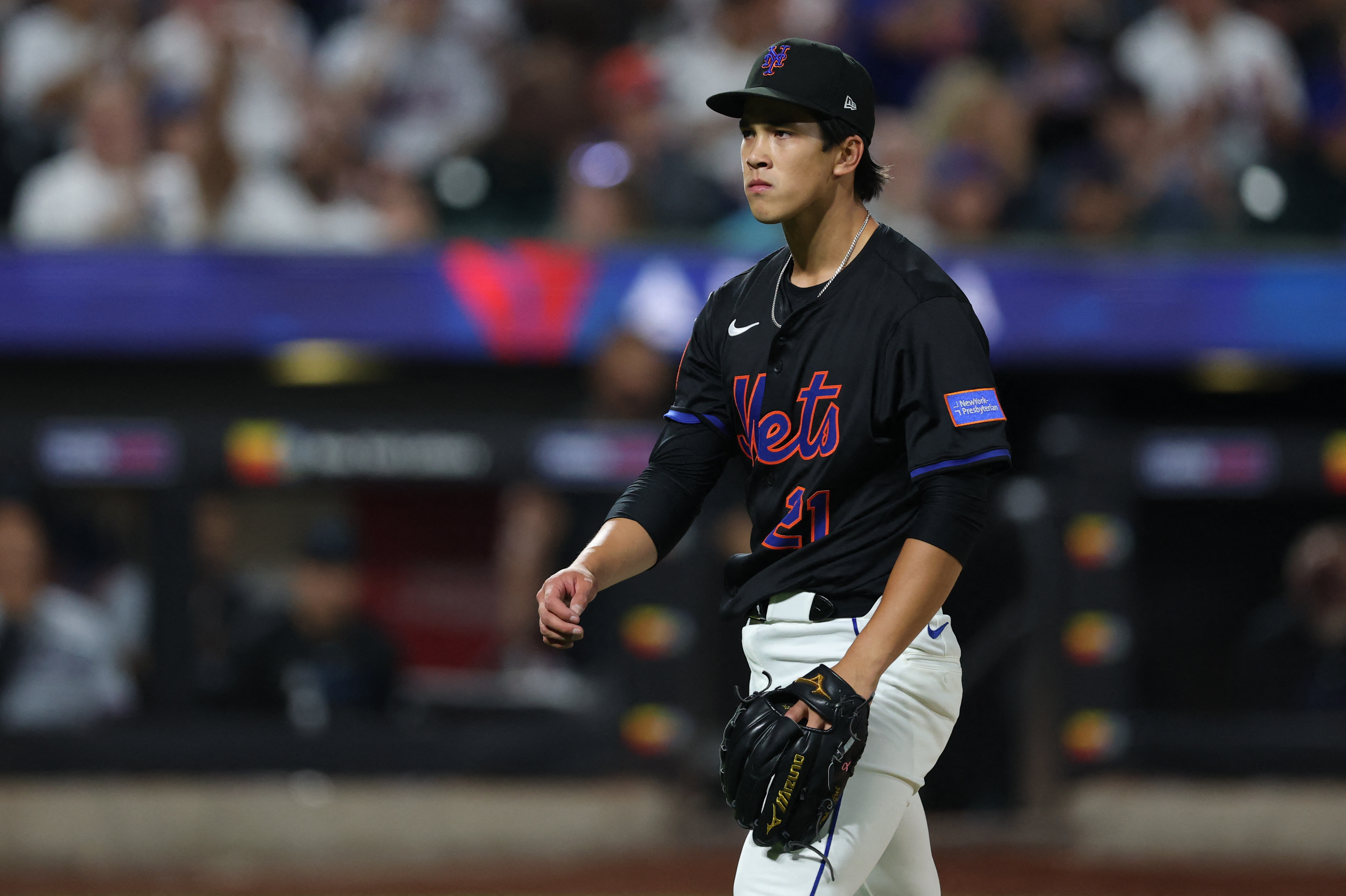 Mets postseason hopes resting on 3 young arms of McLean, Sproat, Tong: 'Crazy? Probably' 4 Jonah Tong Mets Marlins: Man in black uniform walks off baseball field
