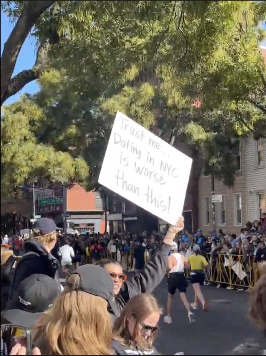 NYC MARATHON | The funniest NYC Marathon signs that could only exist here 2 The sign reads: “Trust me… dating in NYC is worse than this!”