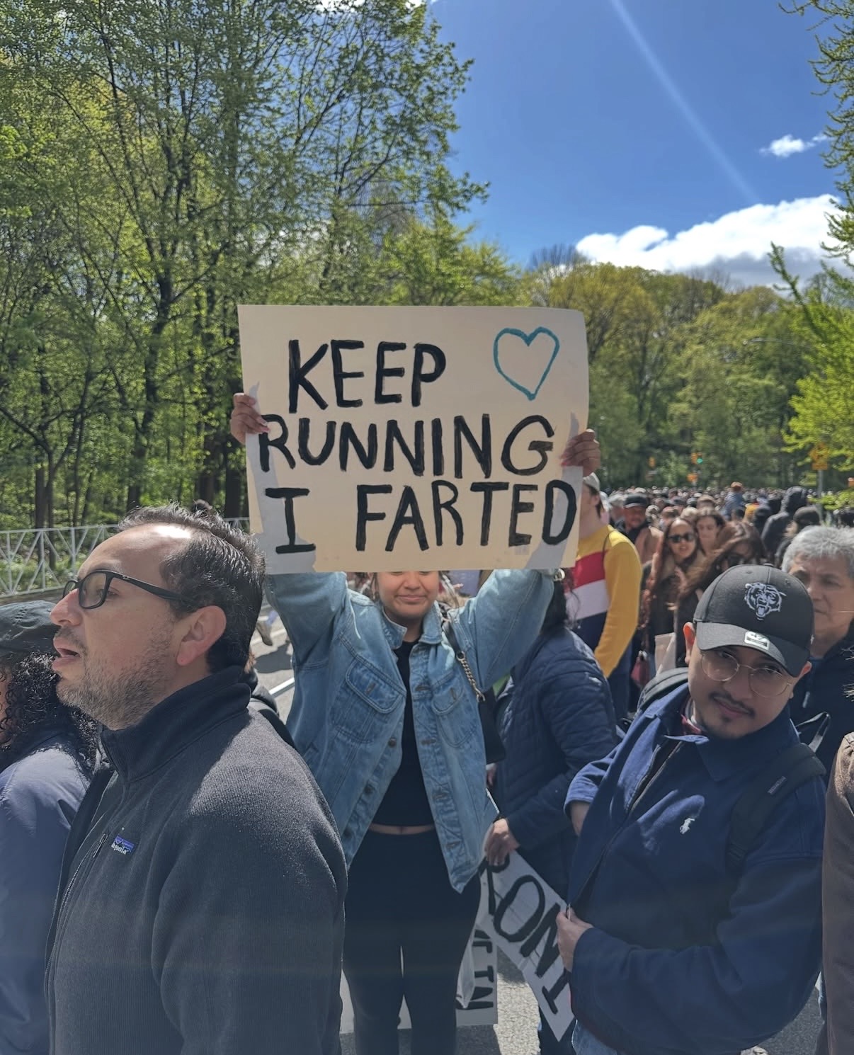 NYC MARATHON | The funniest NYC Marathon signs that could only exist here 8 the sign reads: Keep running, I farted