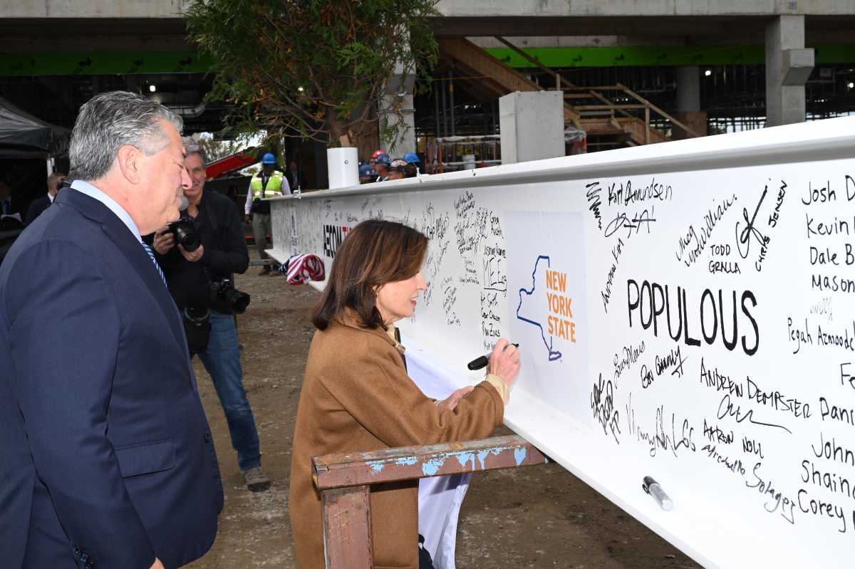 Topping out of new Belmont Park grandstand latest milestone in horse racing's biggest rebuild 3 Gov. Kathy Hochul signs the ceremonial beam topping out the new Belmont Park grandstand on Oct. 15, 2025.