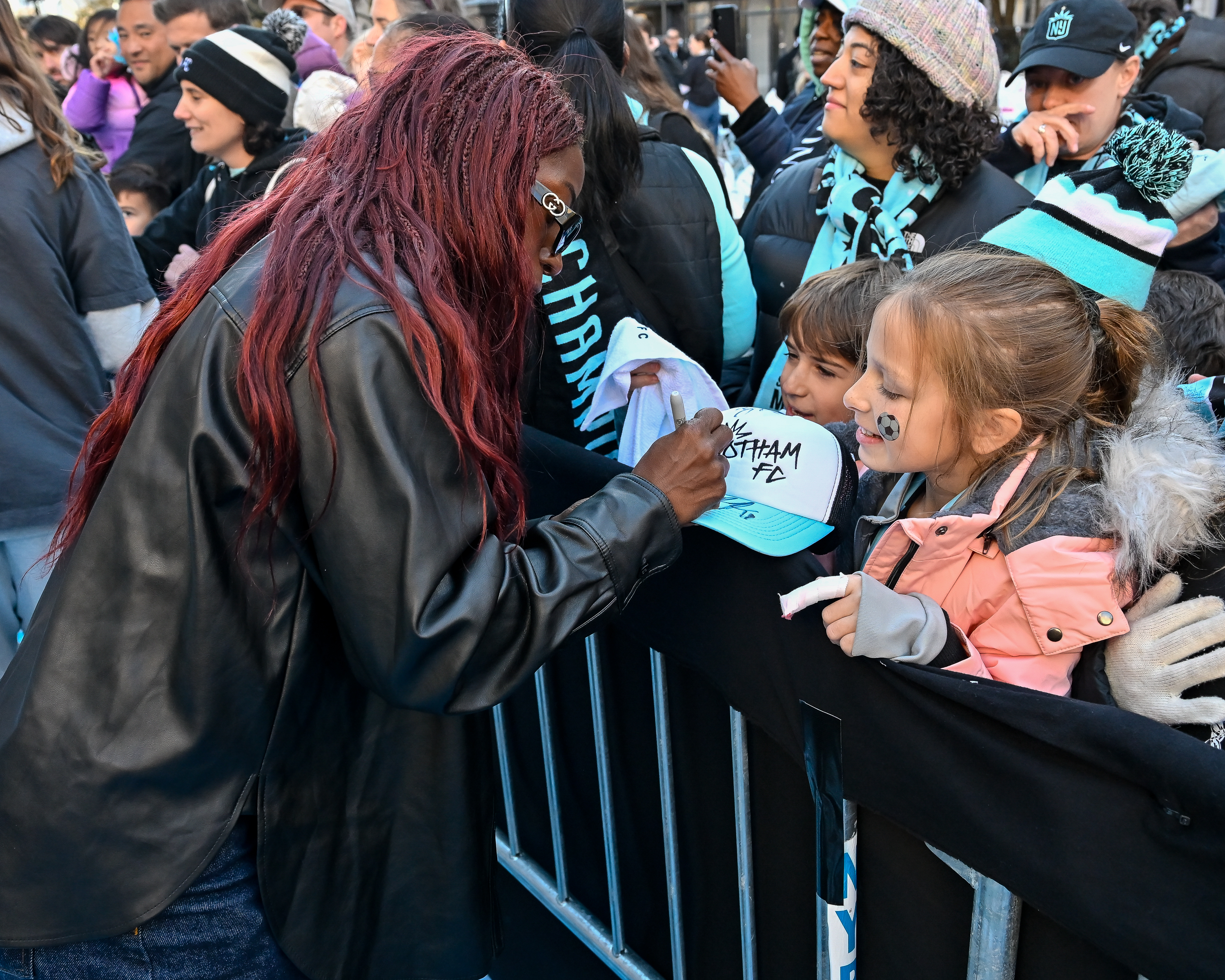‘No Underdogs here:’ Gotham FC receives Keys to the City after stunning NWSL championship playoffs 13 Gotham FC player Mandy Freeman signs autographs for fans after the ceremony.