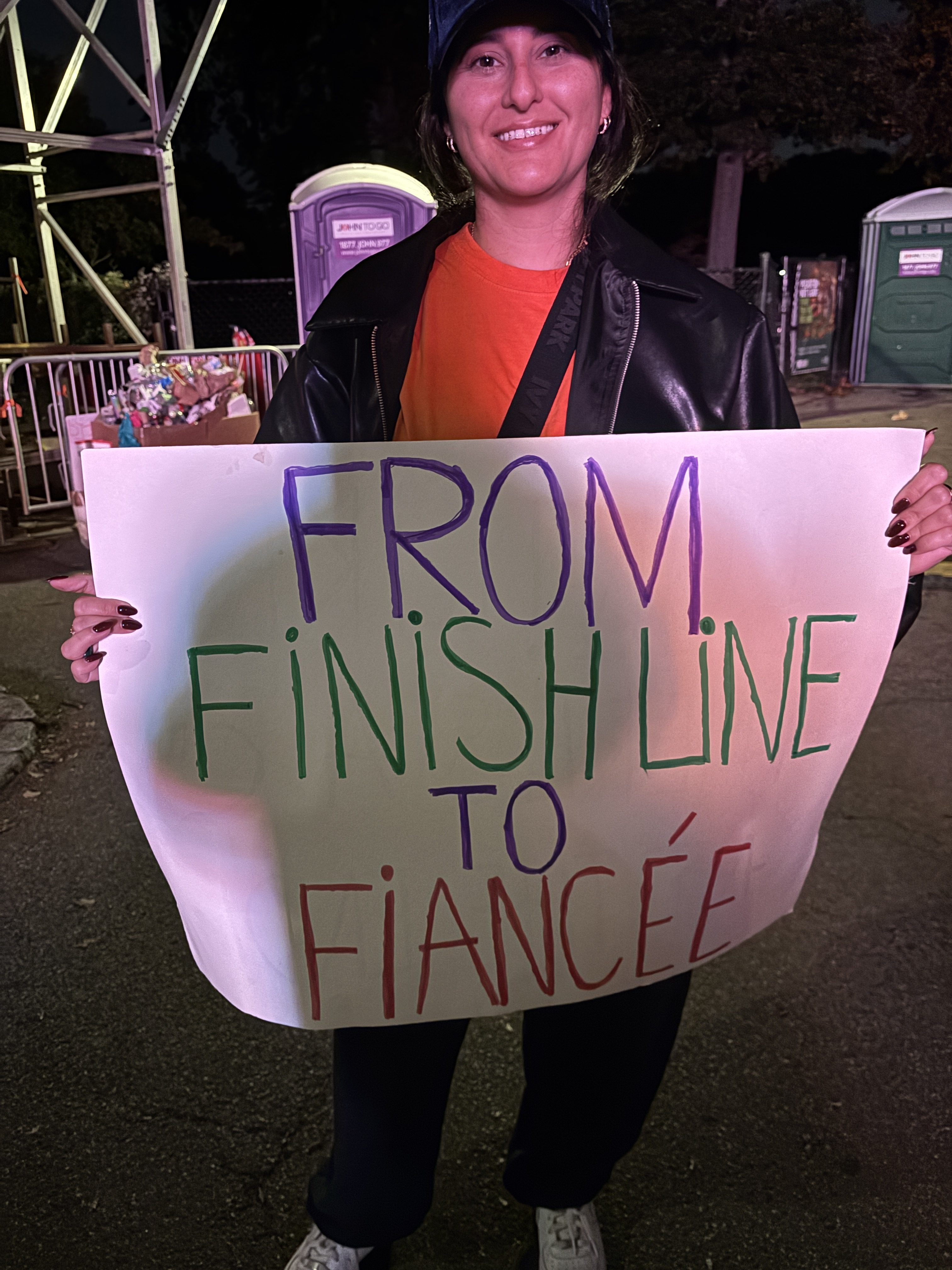 NYC MARATHON: Runner becomes 'Finish Line Fiancée' after race day proposal 2 nyc marathon proposal sign