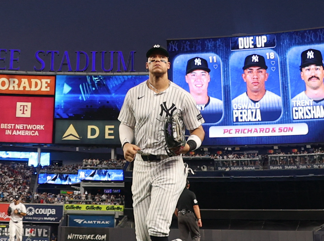 Top 25 of 2025: amNewYork ranks the best NYC athletes of the year 15 Player in white and pinstriped Yankees uniform walking off the field Aaron Judge Yankees