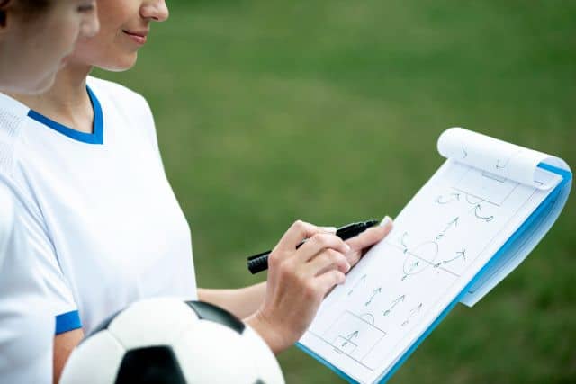 A woman discussing a sports strategy! A woman discussing a sports strategy!