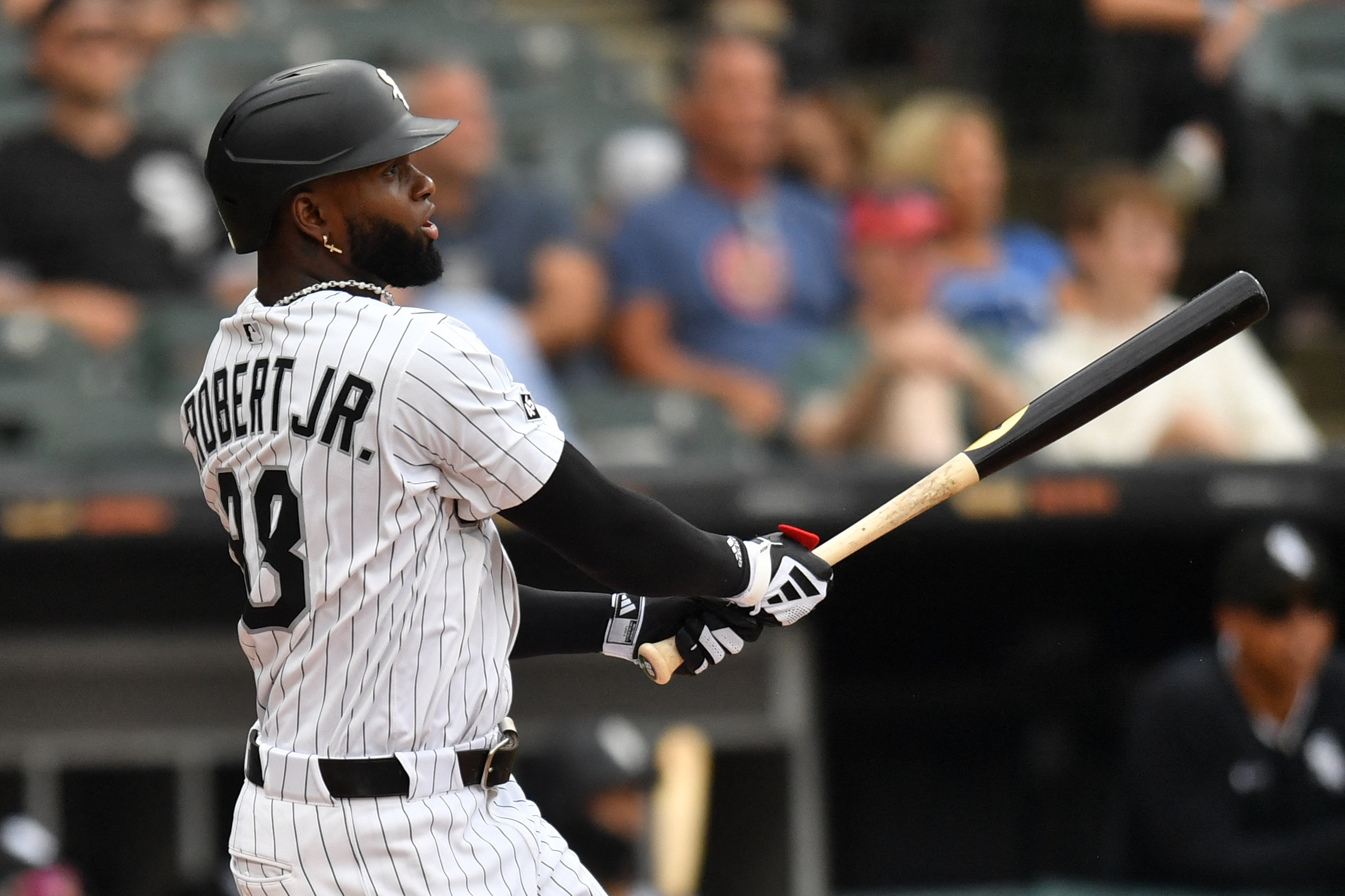 Mets acquire Luis Robert Jr., take low-risk, high-reward swing with former All-Star 2 Luis Robert Jr. Mets trade: Baseball player in white uniform and black helmet watches ball after swinging bat