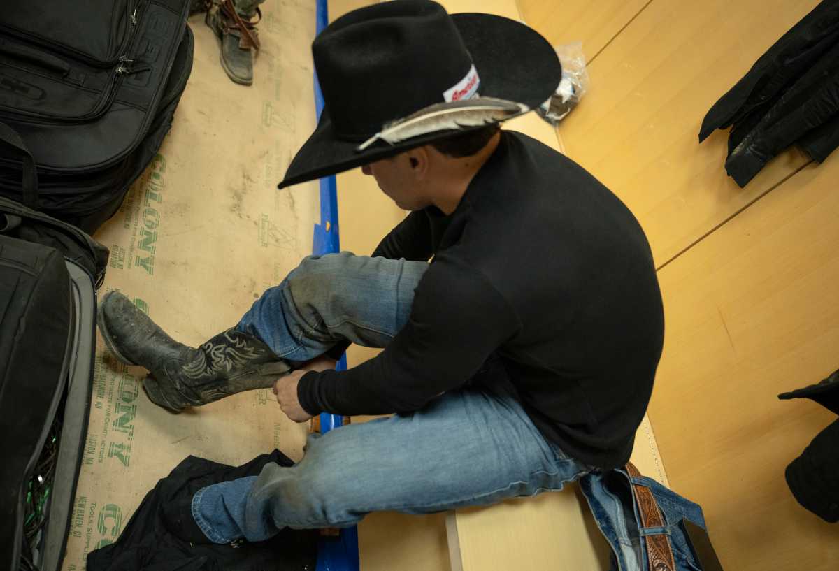 PHOTOS: Professional Bull Riding takes over MSG for three-day sold-out buck-off 11 PBR Riders prepare in the locker room ahead of performing at MSG on Saturday, January 10.