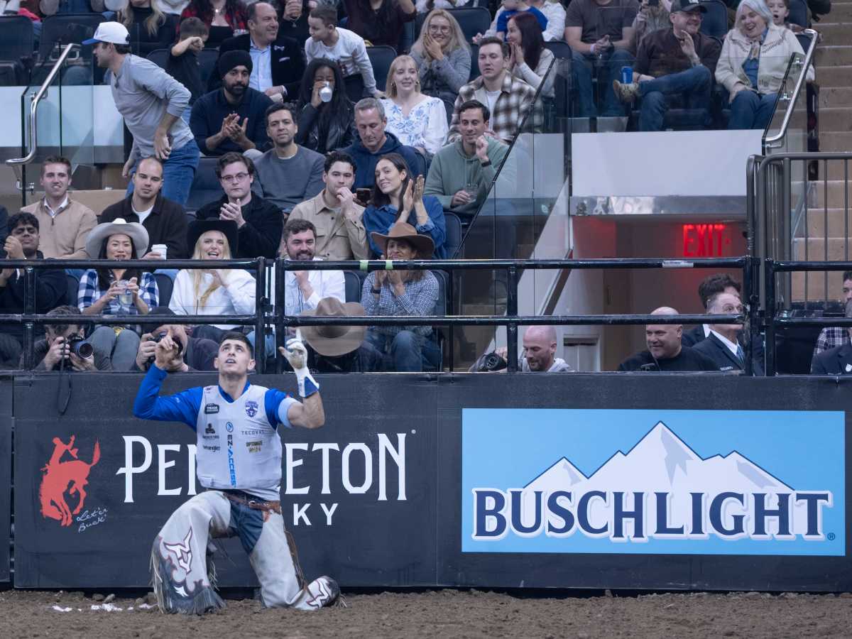 PHOTOS: Professional Bull Riding takes over MSG for three-day sold-out buck-off 5 New York Mavericks rider Leandro Zampollo celebrates a successful ride.
