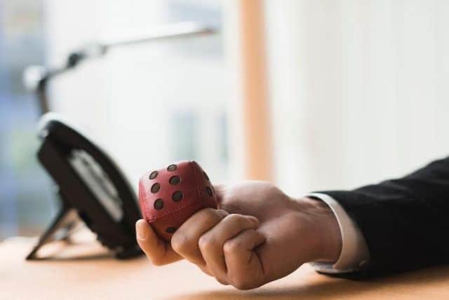 Toy dice in hand Toy dice in hand